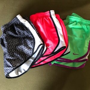 3 pairs of Girls Nike running shorts.  Size Medium